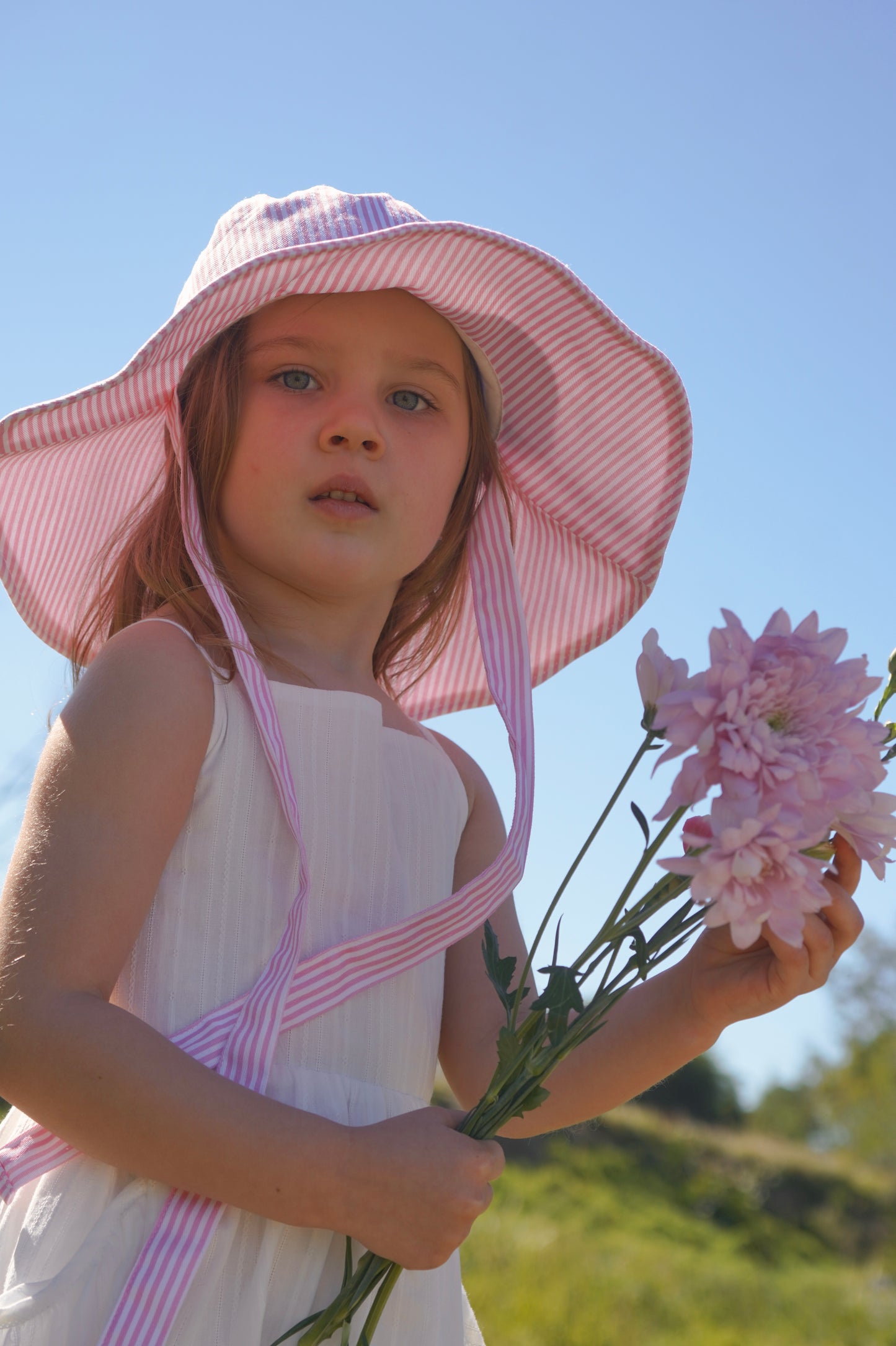
                  
                    Vika Stripe Hat
                  
                